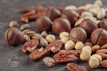 Assorted nuts on a dark background