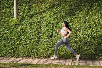 Fototapeta premium a sportswoman running in the park