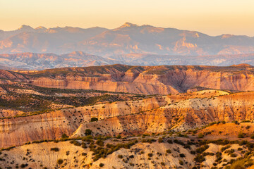 Sunrise over the colorful eroded badlands of the Gorafe desert, los Coloraos, Andalusia, Spain