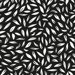 Abstract leaves monochrome seamless repeat pattern. Random placed, vector botanical shapes all over print on black background.