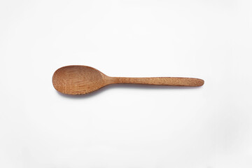A wooden spoon on white background