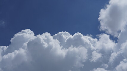 The beautiful summer sky view with the white clouds and blue sky in the sky