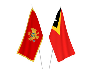 National fabric flags of East Timor and Montenegro isolated on white background. 3d rendering illustration.