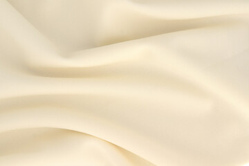 Smooth elegant creamy white silk or elegant satin texture can be used as background, elegant wedding background design.