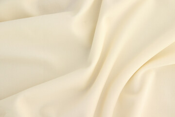 Smooth elegant creamy white silk or elegant satin texture can be used as background, elegant wedding background design.