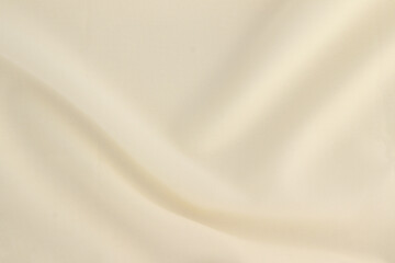 Obraz premium Smooth elegant creamy white silk or elegant satin texture can be used as background, elegant wedding background design.