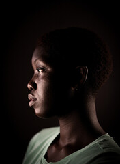 Naklejka premium Beauty face. Smiling black woman portrait. Beautiful candid real face African American girl High quality photo