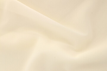 Smooth elegant creamy white silk or elegant satin texture can be used as background, elegant wedding background design.