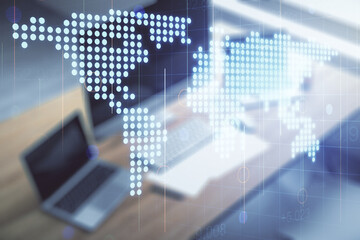 Multi exposure of abstract creative digital world map and modern desktop with laptop on background, research and analytics concept