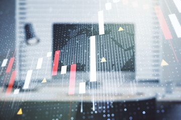 Multi exposure of abstract financial graph with world map on modern computer background, financial and trading concept