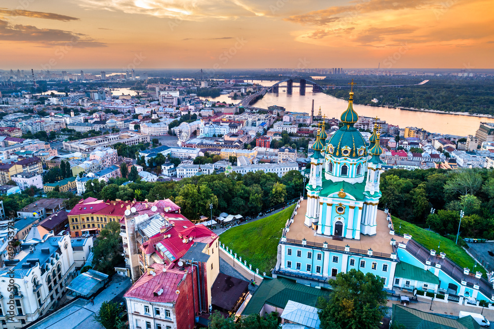 Poster saint andrew church and podil neighborhood in the old town of kiev, ukraine, before the war with rus