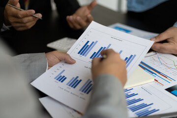 Businesspeople on desk at conference room teamwork with business chart analysis. Concept for meeting business people brainstorming ideas for business strategy planning.