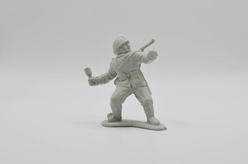 toy soldiers.plastic toys on a white background.Confrontation.