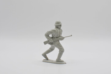 toy soldiers.plastic toys on a white background.Confrontation.