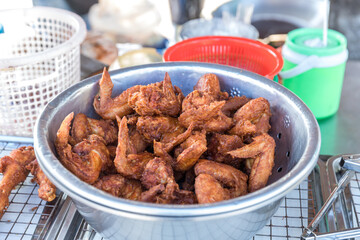 crispy fried chicken on street food market in Thailand. Delicious homemade crispy fried chicken. Crunchy Fried Chicken Ready To Eat