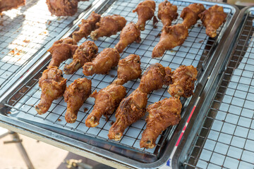 crispy fried chicken on street food market in Thailand. Delicious homemade crispy fried chicken. Crunchy Fried Chicken Ready To Eat