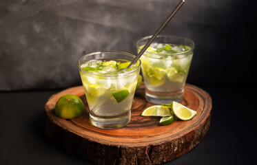 Brazilian Caipirinha. Traditional brazil drink in dark Background