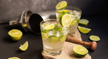 Brazilian Caipirinha. Traditional brazil drink in dark Background