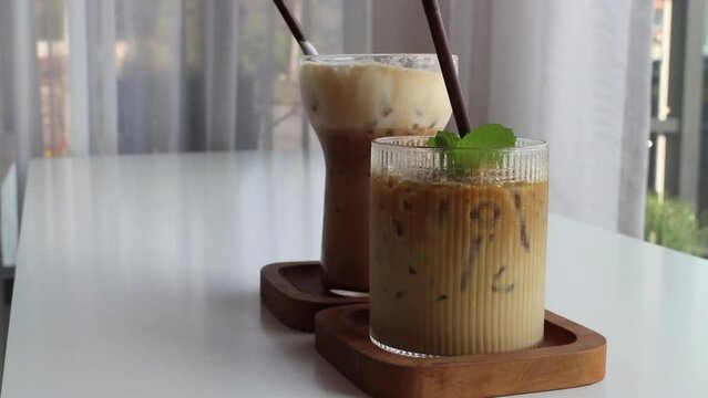 Two glasses of coffee cold refreshing drink, stock footage