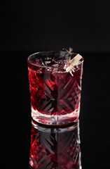 Cocktail in a glass on a black background