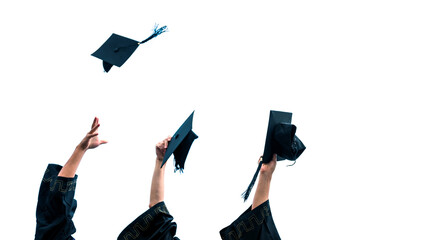 Three graduating students hands throwing graduation caps on white background