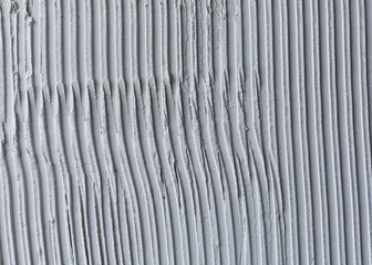 embossed putty with a pattern in the form of stripes of light color