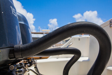 Motors at the stern of a motor boat. Close-up.