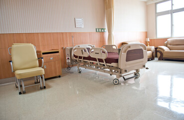 Clean empty bed in a hospital ward