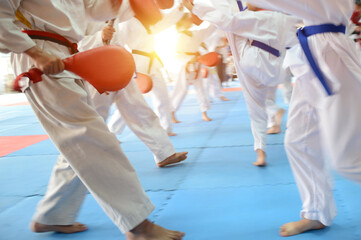 People in martial arts training exercising Taekwondo. blur motion