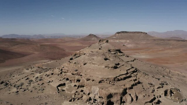 aerial view of mountains containing caves in the south of morocco