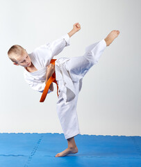 Little athlete beats punch leg © andreyfire