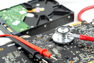 multimeter and laptop repair, computer repair concept