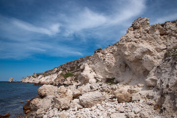 Rocky seashore. Summer seascape. Journey to warmer climes. Natural background.