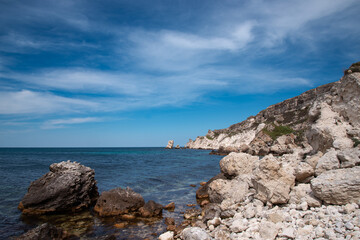 Rocky seashore. Summer seascape. Journey to warmer climes. Natural background.