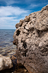 Rocky seashore. Summer seascape. Journey to warmer climes. Natural background.
