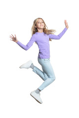 Portrait of cute little girl jumping isolated
