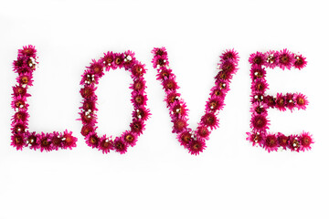 Love sign made from fresh flowers. Love concept