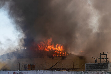 Fototapeta na wymiar Fire. Burning building.