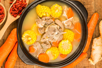 Stewed mutton soup with corn and carrot