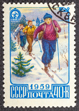RUSSIA - CIRCA 1969: Stamp printed in USSR Russia , shows tourists skiing in forest, series Tourism in USSR, circa 1959