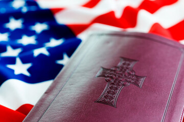 Bible on top of american flag