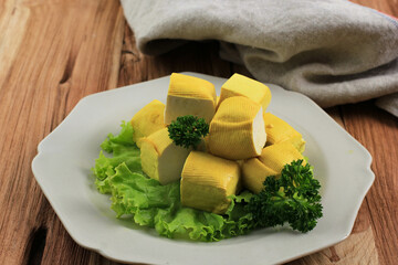 Yellow Tofu on Ceramic Plate