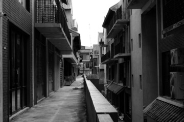 narrow street in the old town black and white  architecture city building