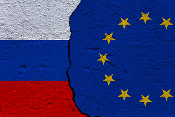 Flag of Russia and Europe painted on a brick wall. The tense relationship between Russia and Europe concept.