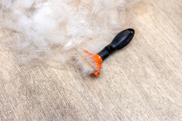 furminator for grooming animals. dog hair. molt