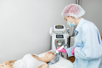 Rf facelifting procedure. Face care and rejuvenation. Increased tone of the epidermis. rf-face lifting.