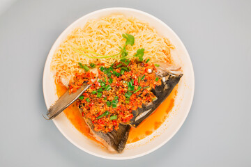Steamed fish head with diced hot red peppers