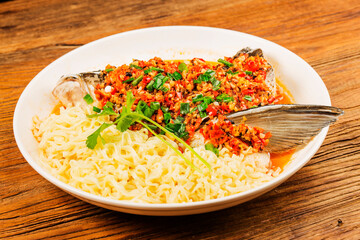Steamed fish head with diced hot red peppers