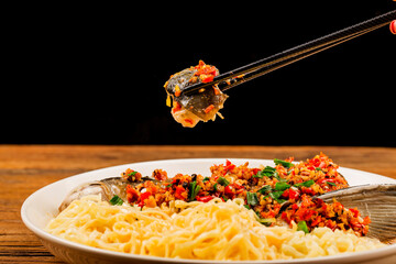 Steamed fish head with diced hot red peppers