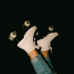 Roller skates retro Legs in air on road flash night time